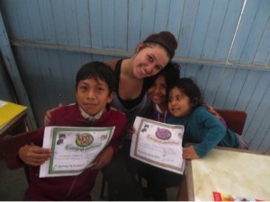 This is Mariel and Gabriel on the day they moved up a level in Their English “Let’s Go” books. Oh and the little peanut is Brenda Nicole….Mariel’s little sister.