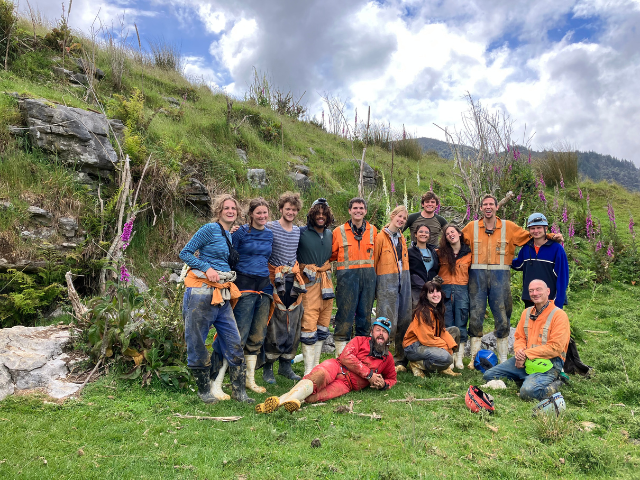 students in a group after cave hike